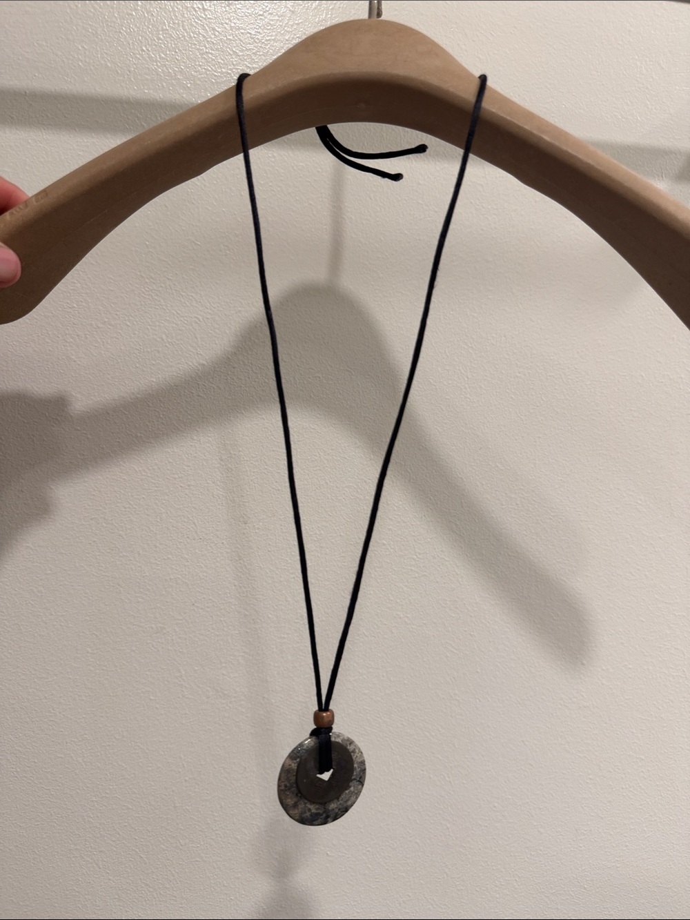 Black Cord Necklace with Textured Stone Donut Pendant